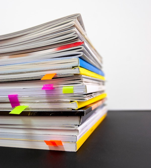 Stack of magazines waiting to be read later